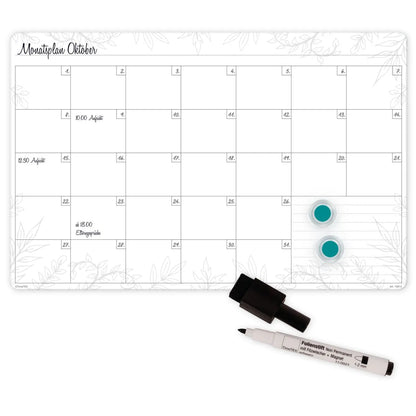 Monatsplan mit Stift und Magnete