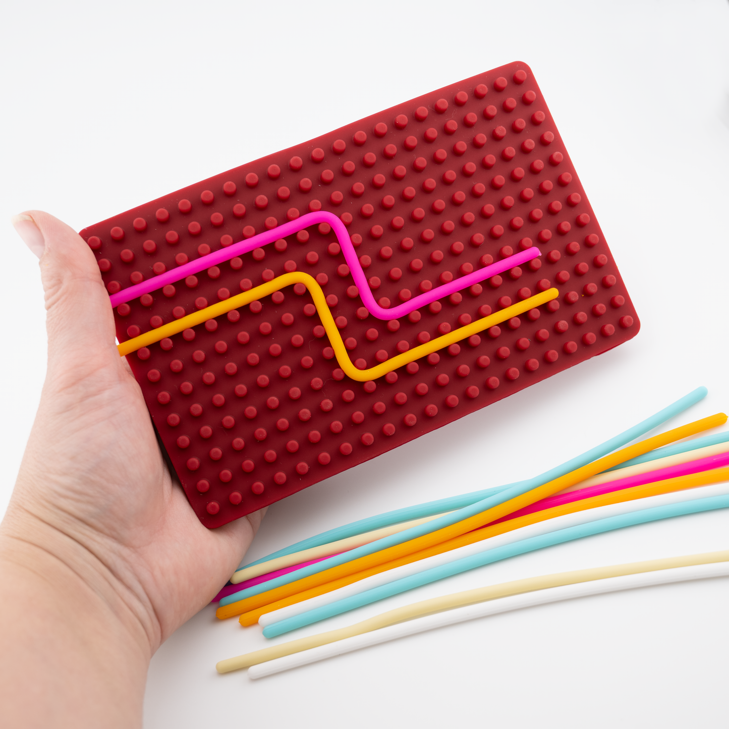 Stäbe in Board eingefädelt