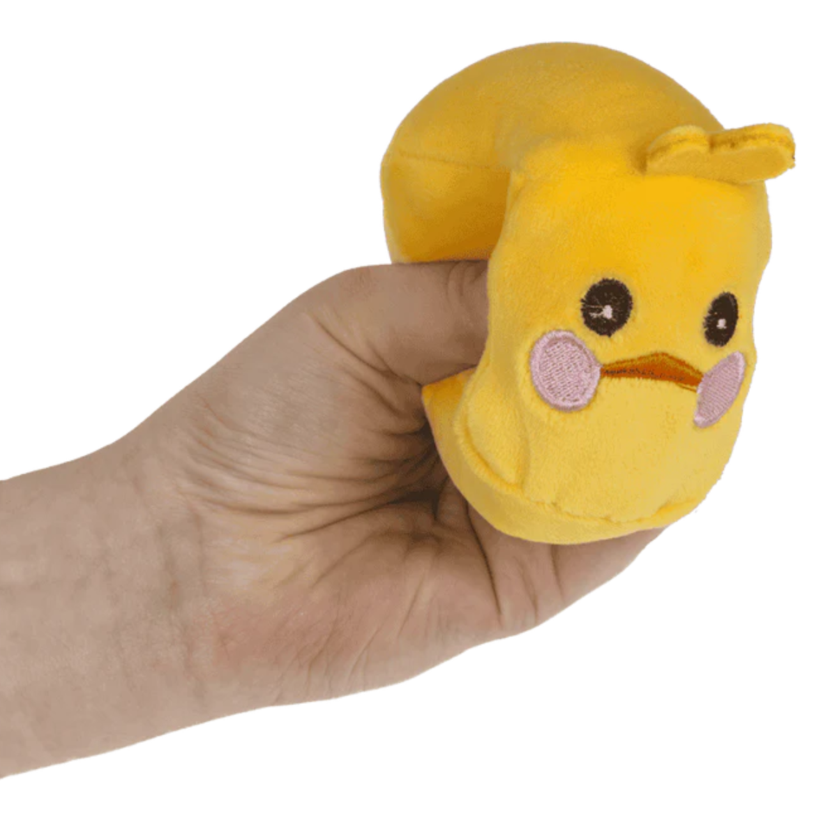 Hand drückt gelbe Ente