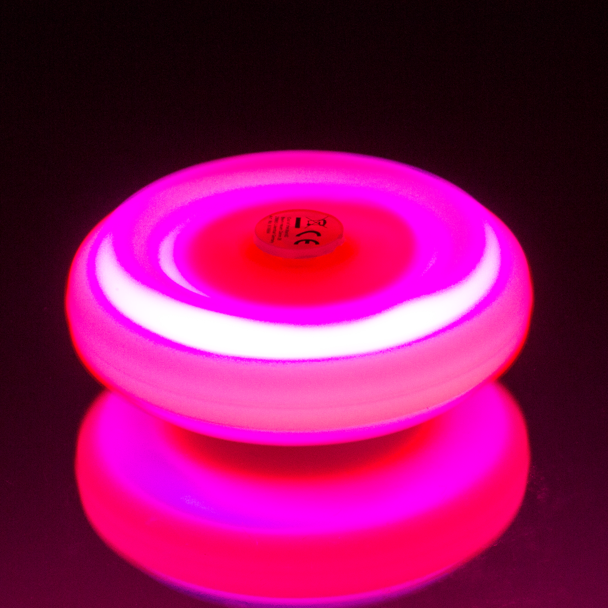 rosa Ufo leuchtet im dunklen,