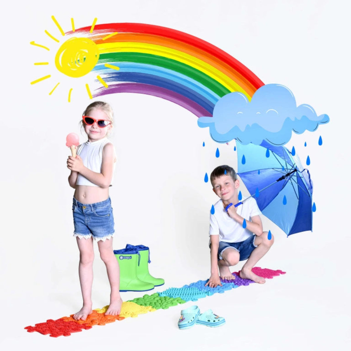 Kinder auf Regenbogenmatte