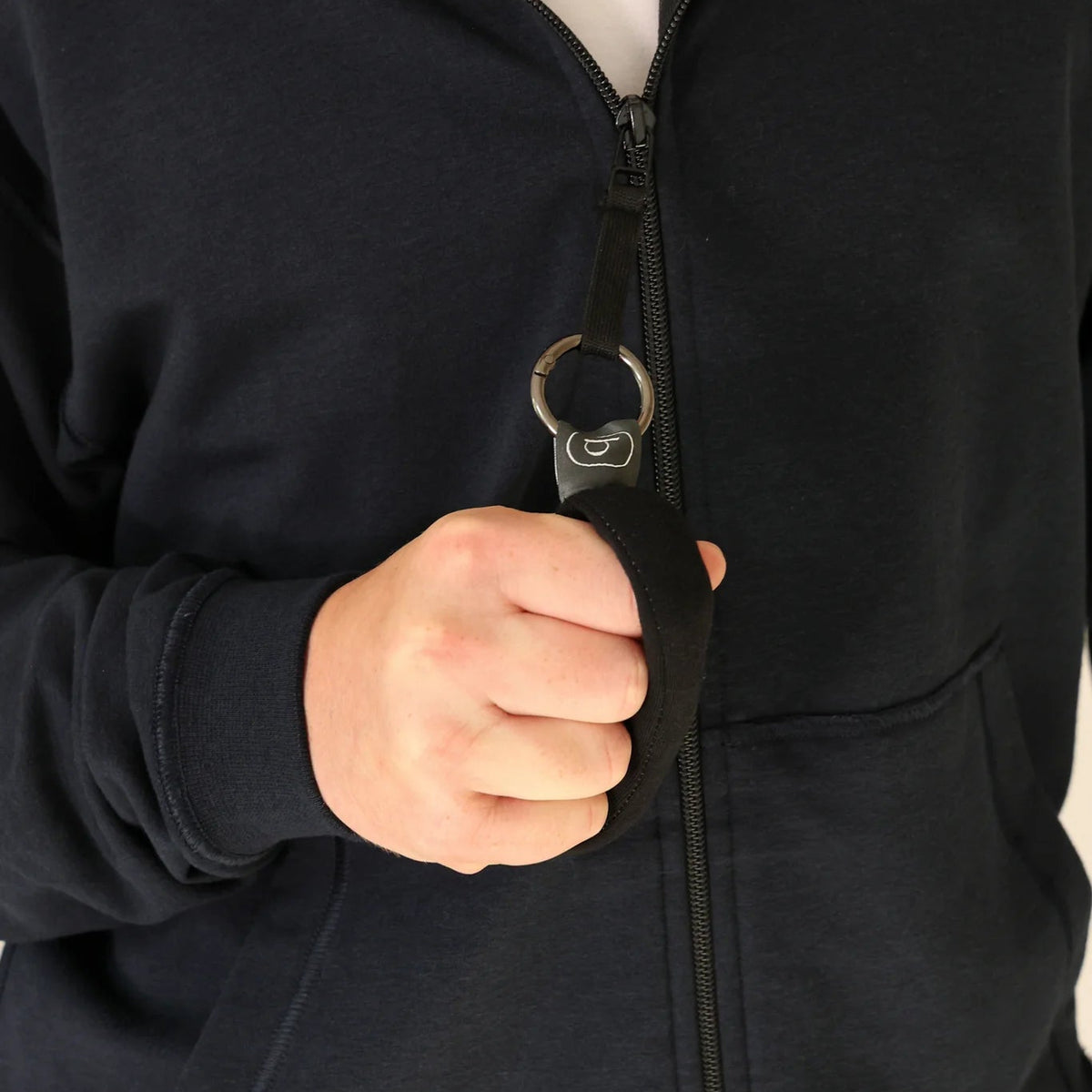 Hand im schwarzem Loop