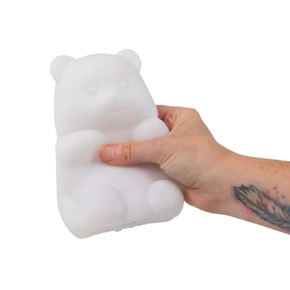 Hand drückt Sqishylampe