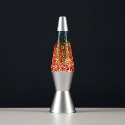 Glitzerlampe vor schwarzem Hintergrund
